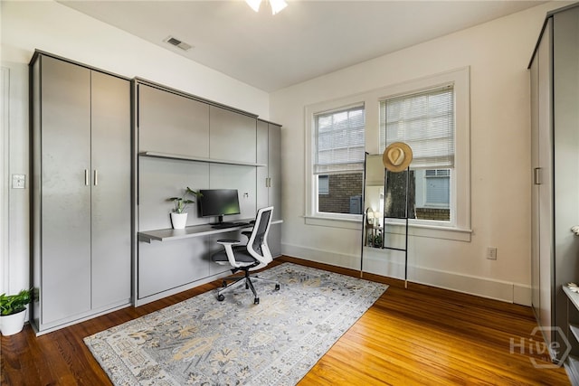 316 E 51st St, Savannah, GA 31405 - home office featuring wood finished floors and baseboards