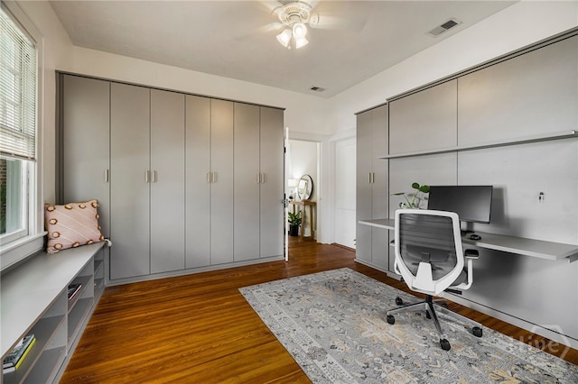316 E 51st St, Savannah, GA 31405 - office space featuring a ceiling fan and dark wood-type flooring