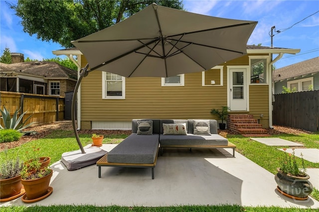 316 E 51st St, Savannah, GA 31405 - fenced backyard with entry steps, an outdoor living space, and a patio area