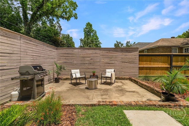 316 E 51st St, Savannah, GA 31405 - fenced backyard featuring area for grilling and a patio
