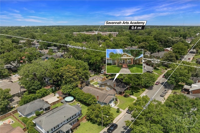 316 E 51st St, Savannah, GA 31405 - aerial view of residential area with property parcel outlined and a heavily wooded area