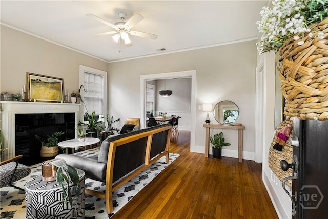 316 E 51st St, Savannah, GA 31405 - living area featuring hardwood / wood-style floors, ceiling fan, a tiled fireplace, and ornamental molding