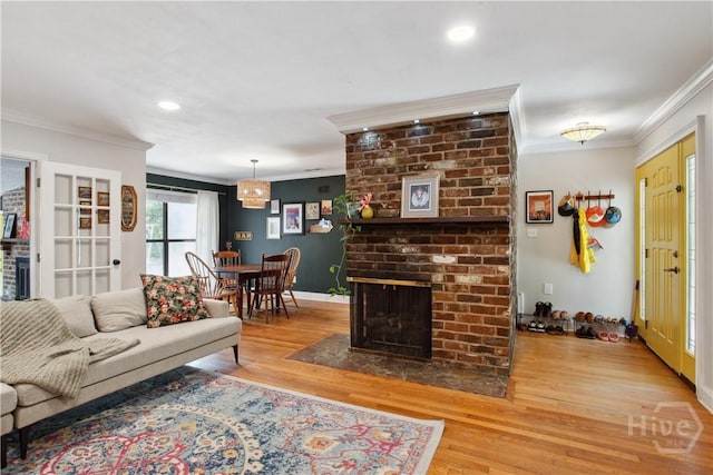 5527 Habersham St, Savannah, GA 31405 - living area with ornamental molding, wood finished floors, recessed lighting, and a fireplace