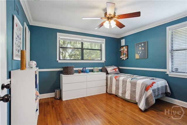 5527 Habersham St, Savannah, GA 31405 - bedroom with hardwood / wood-style floors, crown molding, and ceiling fan