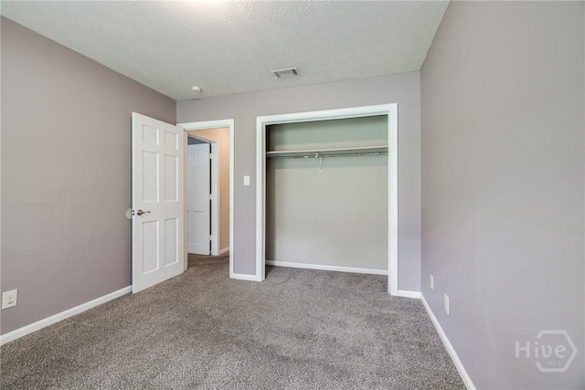41 Barrington Cir, Savannah, GA 31419 - unfurnished bedroom featuring carpet floors, a closet, and a textured ceiling