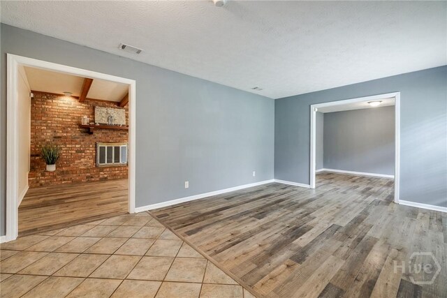 41 Barrington Cir, Savannah, GA 31419 - empty room featuring wood finished floors and brick wall