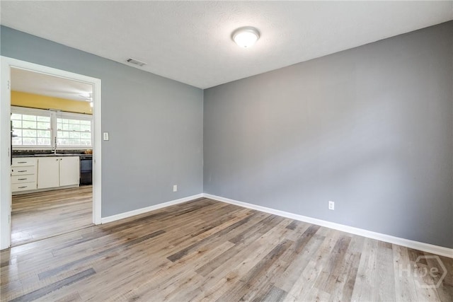 41 Barrington Cir, Savannah, GA 31419 - spare room with light wood finished floors and baseboards