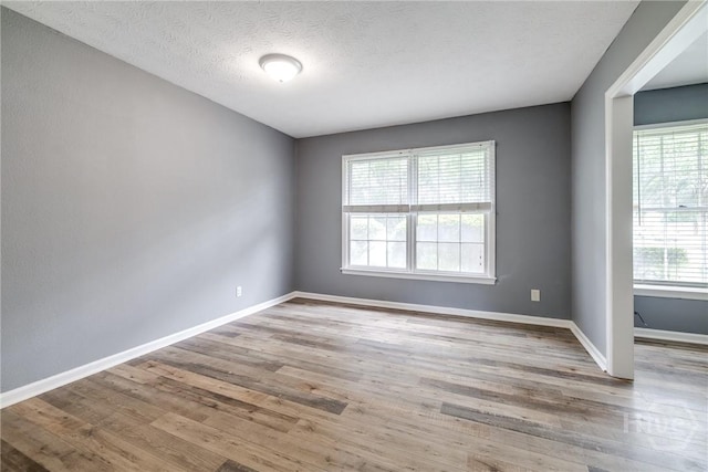 41 Barrington Cir, Savannah, GA 31419 - unfurnished room featuring wood finished floors and a textured ceiling