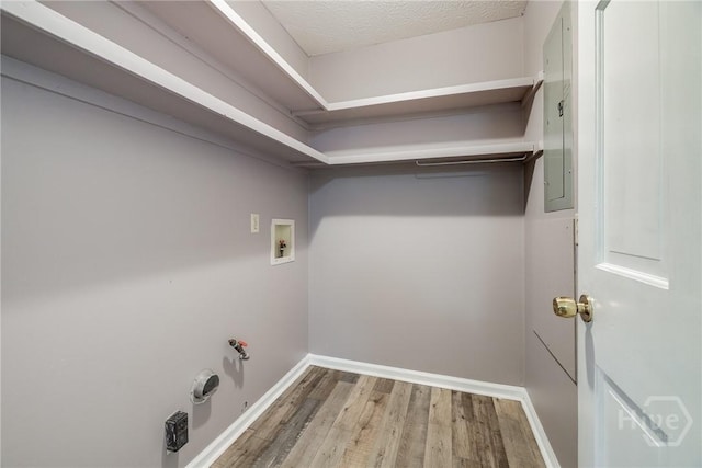41 Barrington Cir, Savannah, GA 31419 - laundry area with washer hookup, wood finished floors, and gas dryer hookup