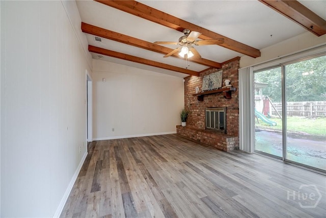 41 Barrington Cir, Savannah, GA 31419 - unfurnished living room featuring wood finished floors, a brick fireplace, and a ceiling fan