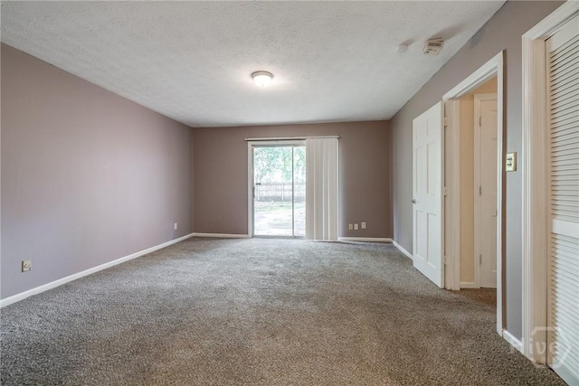 41 Barrington Cir, Savannah, GA 31419 - carpeted spare room with a textured ceiling and a smoke detector