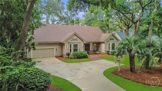8 Boars Nest Ln, Savannah, GA 31411 - view of front of home featuring driveway and a shingled roof
