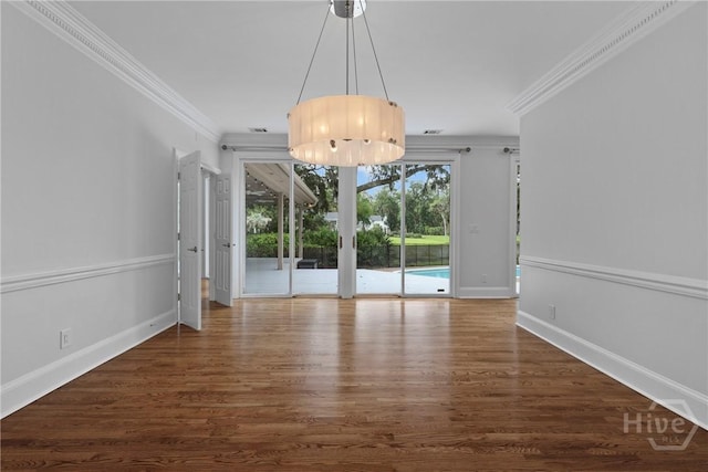 8 Boars Nest Ln, Savannah, GA 31411 - unfurnished dining area with ornamental molding and wood finished floors