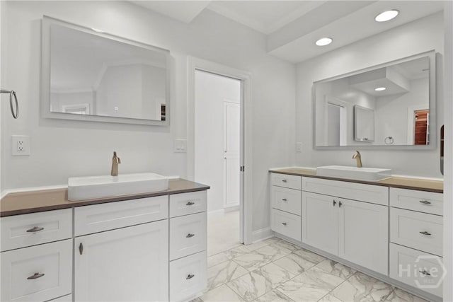 8 Boars Nest Ln, Savannah, GA 31411 - full bath with marble finish floors, two vanities, and recessed lighting