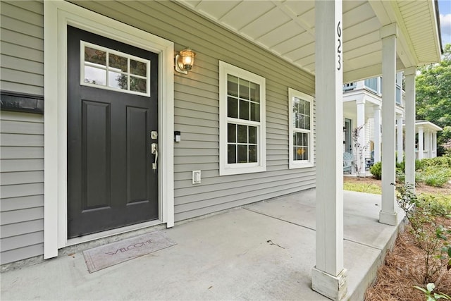 623 E Henry St, Savannah, GA 31401 - property entrance featuring a porch