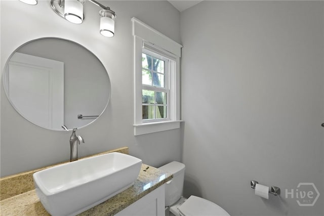 623 E Henry St, Savannah, GA 31401 - half bathroom with toilet and vanity