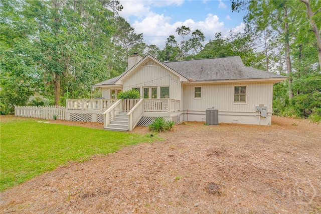 3 Franklin Creek Rd S, Savannah, GA 31411 - back of house with a chimney, a deck, crawl space, a lawn, and a shingled roof