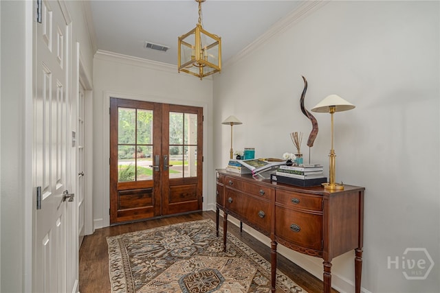 3 Franklin Creek Rd S, Savannah, GA 31411 - entrance foyer with french doors, a chandelier, dark wood-type flooring, and crown molding