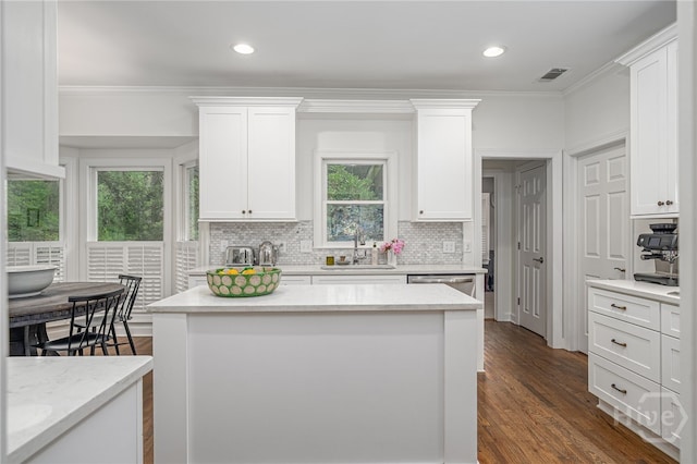 3 Franklin Creek Rd S, Savannah, GA 31411 - kitchen featuring backsplash, white cabinetry, ornamental molding, dark wood-style floors, and recessed lighting