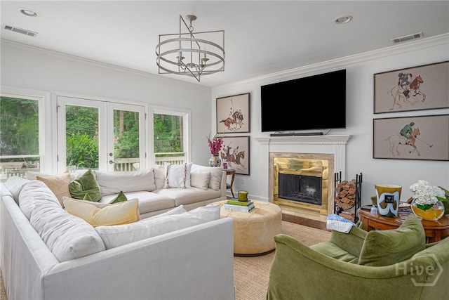 3 Franklin Creek Rd S, Savannah, GA 31411 - living area with crown molding, a stone fireplace, a chandelier, and recessed lighting