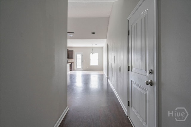 1506 Bayberry Dr, Hinesville, GA 31313 - corridor with baseboards and dark wood finished floors
