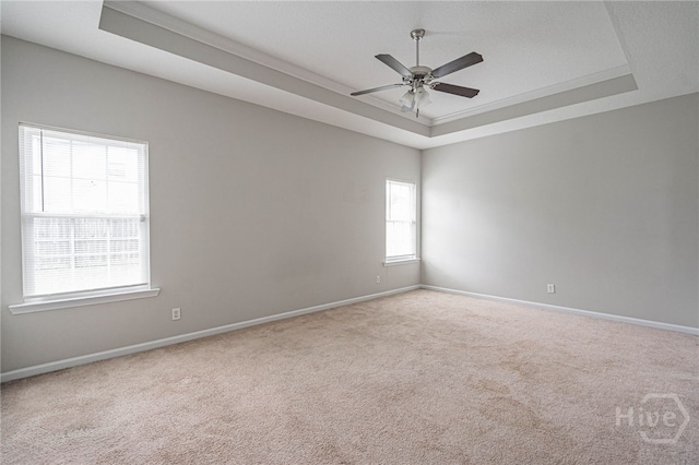 1506 Bayberry Dr, Hinesville, GA 31313 - empty room with a raised ceiling, carpet flooring, ceiling fan, and ornamental molding