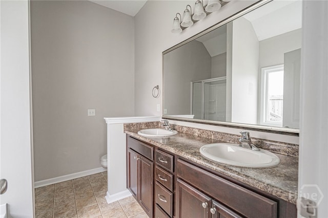 1506 Bayberry Dr, Hinesville, GA 31313 - full bathroom with double vanity, a stall shower, and tile patterned floors