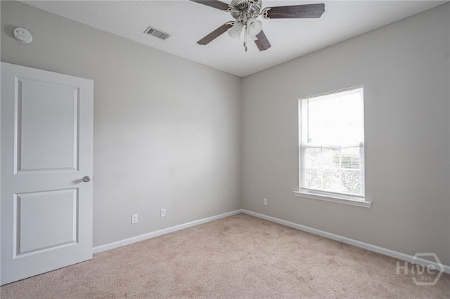 1506 Bayberry Dr, Hinesville, GA 31313 - carpeted empty room with a ceiling fan and a smoke detector