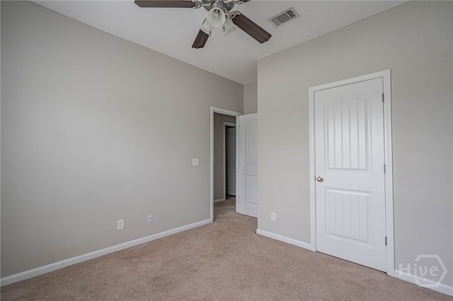 1506 Bayberry Dr, Hinesville, GA 31313 - unfurnished bedroom with light colored carpet and ceiling fan