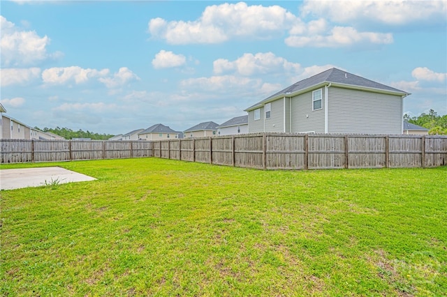 1506 Bayberry Dr, Hinesville, GA 31313 - fenced backyard featuring a patio and a residential view