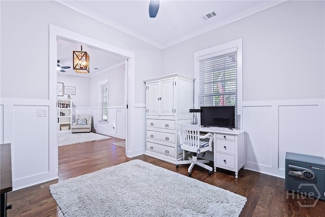 370 Blackjack Oak Dr W, Richmond Hill, GA 31324 - home office featuring a ceiling fan, a decorative wall, wainscoting, dark wood-type flooring, and ornamental molding