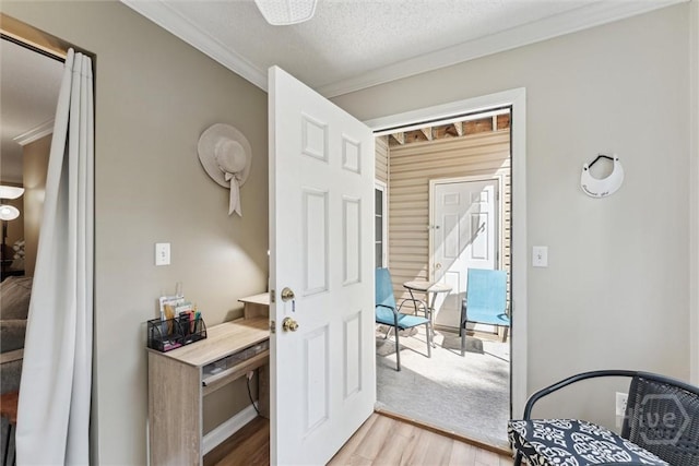 12300 Apache Ave Unit 1003, Savannah, GA 31419 - doorway featuring light wood-style flooring, ornamental molding, and stairs