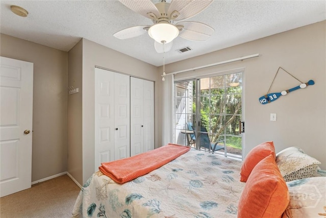 12300 Apache Ave Unit 1003, Savannah, GA 31419 - bedroom with access to outside, carpet floors, a closet, ceiling fan, and a textured ceiling