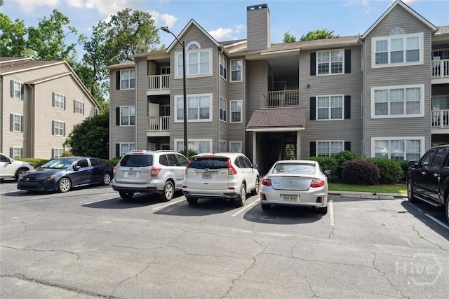 12300 Apache Ave Unit 1003, Savannah, GA 31419 - view of building exterior featuring uncovered parking