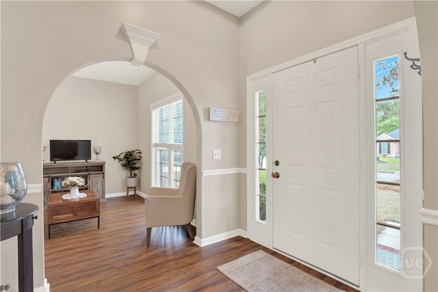 306 Walthour Dr, Rincon, GA 31326 - entryway featuring arched walkways and dark wood finished floors