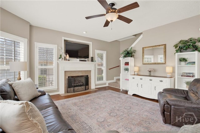 306 Walthour Dr, Rincon, GA 31326 - living room with ceiling fan, healthy amount of natural light, stairs, and wood finished floors