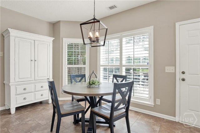 306 Walthour Dr, Rincon, GA 31326 - dining space featuring a chandelier and light tile patterned floors