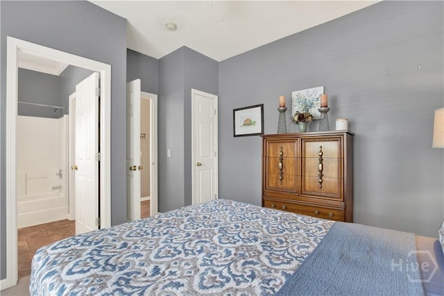 306 Walthour Dr, Rincon, GA 31326 - bedroom with tile patterned floors and connected bathroom