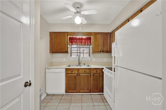 25 Colony Park Dr, Savannah, GA 31406 - kitchen featuring white appliances, brown cabinetry, ceiling fan, and light countertops