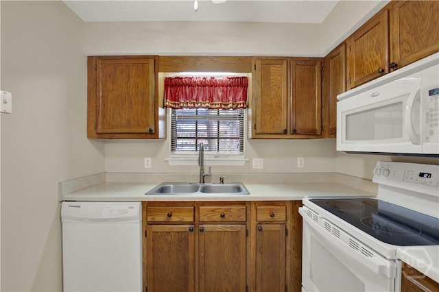 25 Colony Park Dr, Savannah, GA 31406 - kitchen with white appliances, light countertops, and brown cabinetry