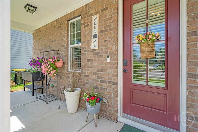 143 Arusha Ave, Savannah, GA 31419 - entrance to property with a porch and brick siding