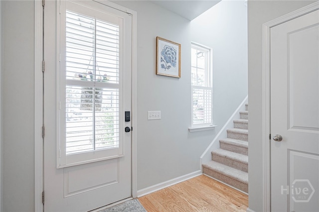 143 Arusha Ave, Savannah, GA 31419 - doorway featuring wood finished floors, plenty of natural light, and stairway