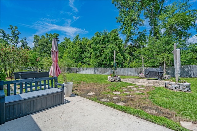 143 Arusha Ave, Savannah, GA 31419 - fenced backyard featuring a hot tub and a patio area