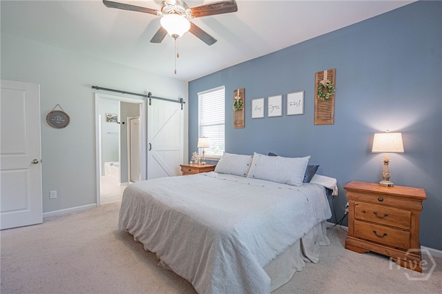 143 Arusha Ave, Savannah, GA 31419 - carpeted bedroom featuring a barn door, connected bathroom, and ceiling fan