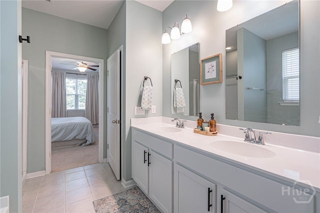 143 Arusha Ave, Savannah, GA 31419 - ensuite bathroom featuring double vanity, tile patterned flooring, and a ceiling fan