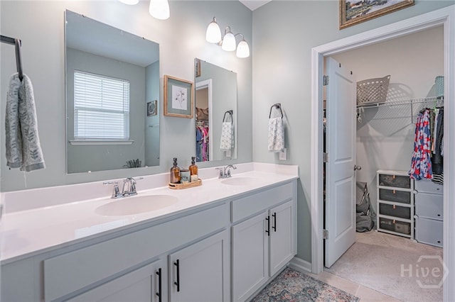 143 Arusha Ave, Savannah, GA 31419 - bathroom featuring double vanity and a spacious closet