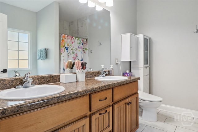 18 Sagefield Dr, Ellabell, GA 31308 - full bathroom with double vanity, tile patterned flooring, and a shower with curtain