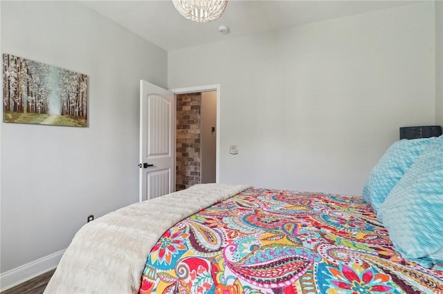 18 Sagefield Dr, Ellabell, GA 31308 - bedroom with wood finished floors and baseboards