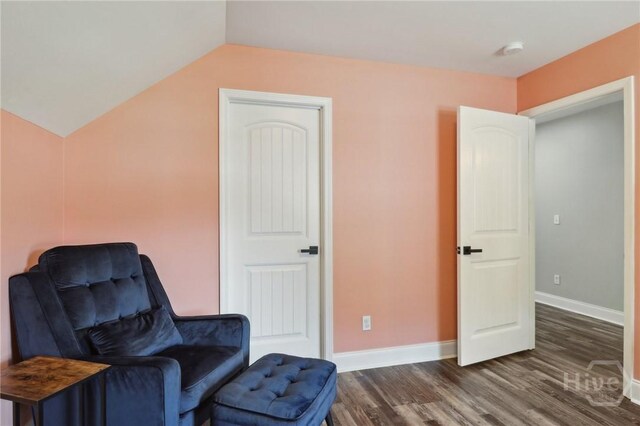 18 Sagefield Dr, Ellabell, GA 31308 - sitting room with dark wood-style floors and lofted ceiling