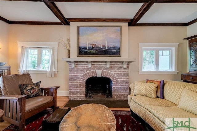 215 E 45th St, Savannah, GA 31405 - living area with coffered ceiling, a fireplace, wood finished floors, beamed ceiling, and ornamental molding